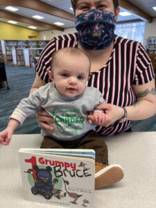 photo of baby in library