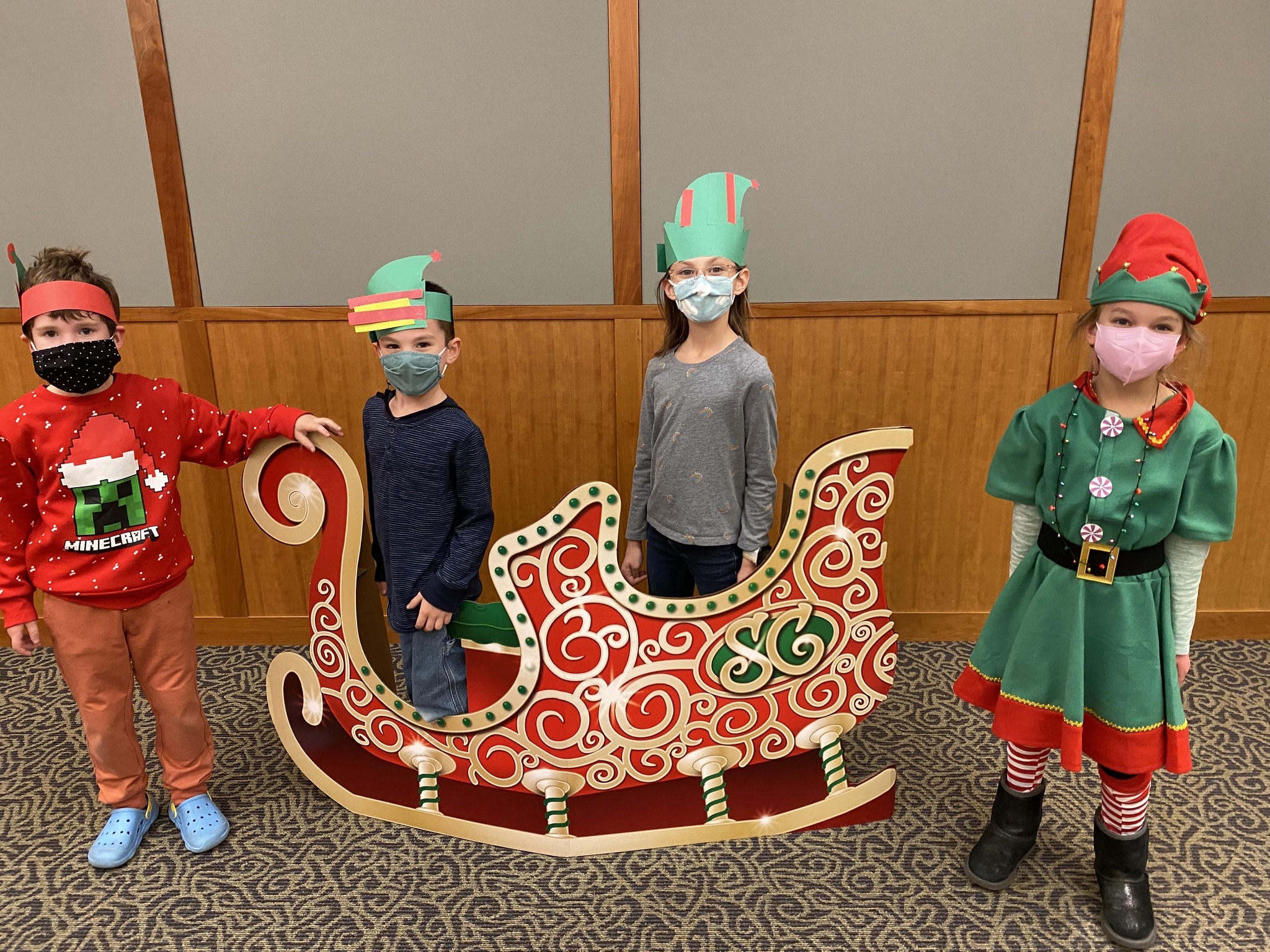 photo of children with sleigh