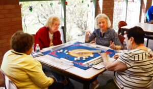 photo of women playing a game at the library